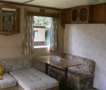 You can make-up a double bed in the dining area of the standard holiday caravan