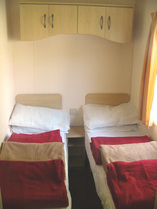 Twin room in luxury holiday caravan