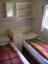 Twin room in a standard holiday caravan