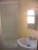 Shower room with sit down shower in luxury holiday caravan