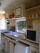 Well equipped kitchen in a standard holiday caravan